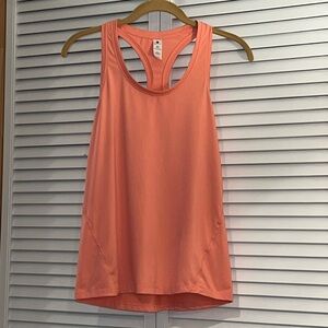 YOGAlicious Racer-Back Tank Top. Size XS. Color is a pretty Coral/Salmon.